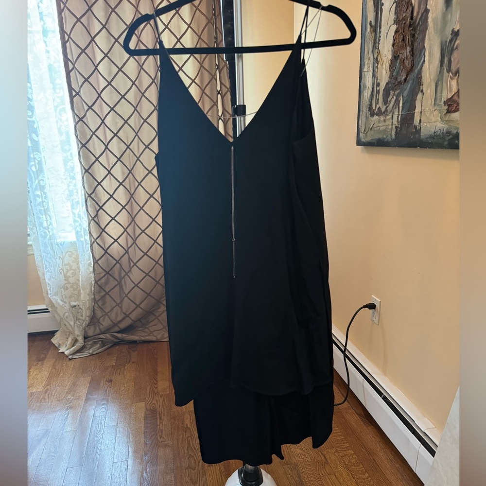 Dress short and long in the back with chain detailing